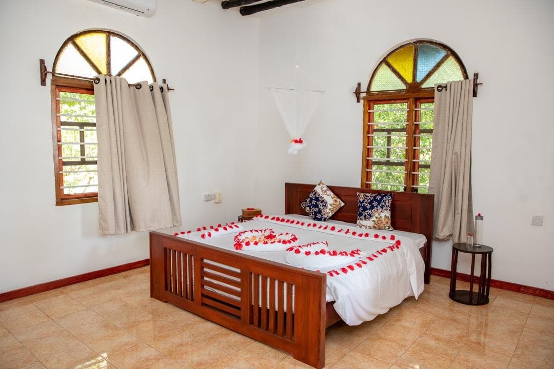 Ocean-front suite bedroom at Veridiana Hotel Zanzibar