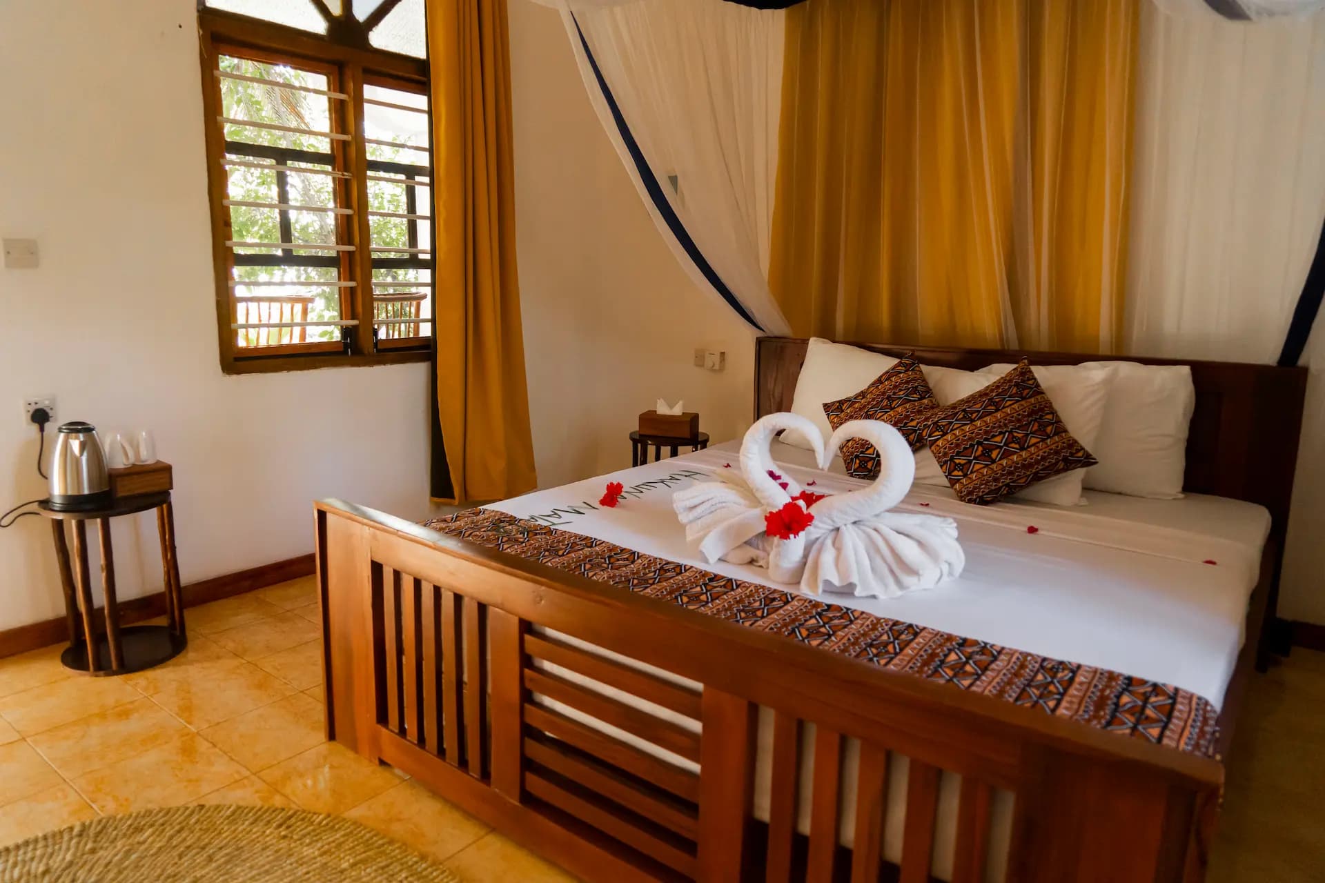 Deluxe Room Panoramic Ocean View bedroom at Veridiana Hotel