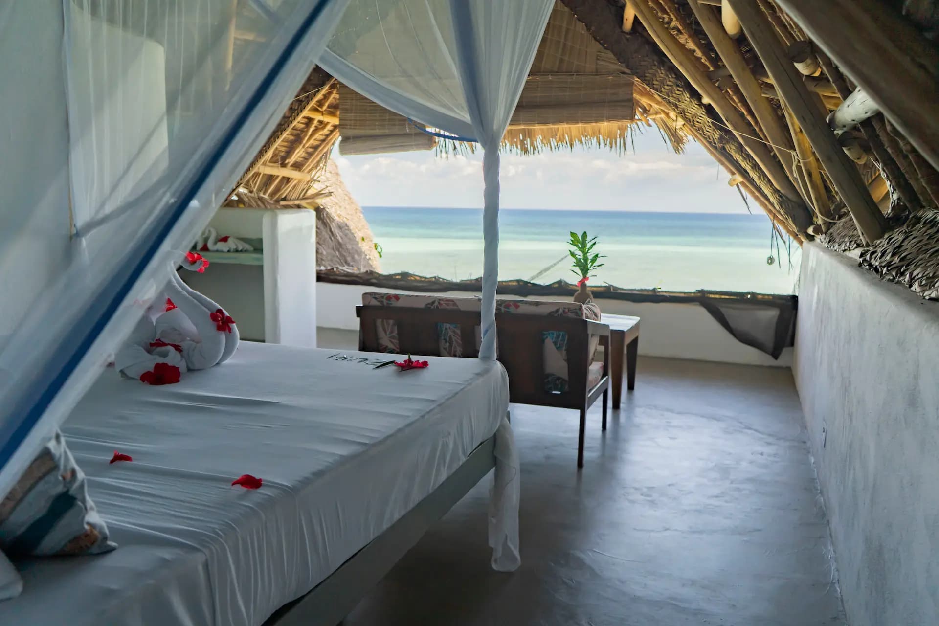 Deluxe Room Ocean View bedroom at Veridiana Hotel